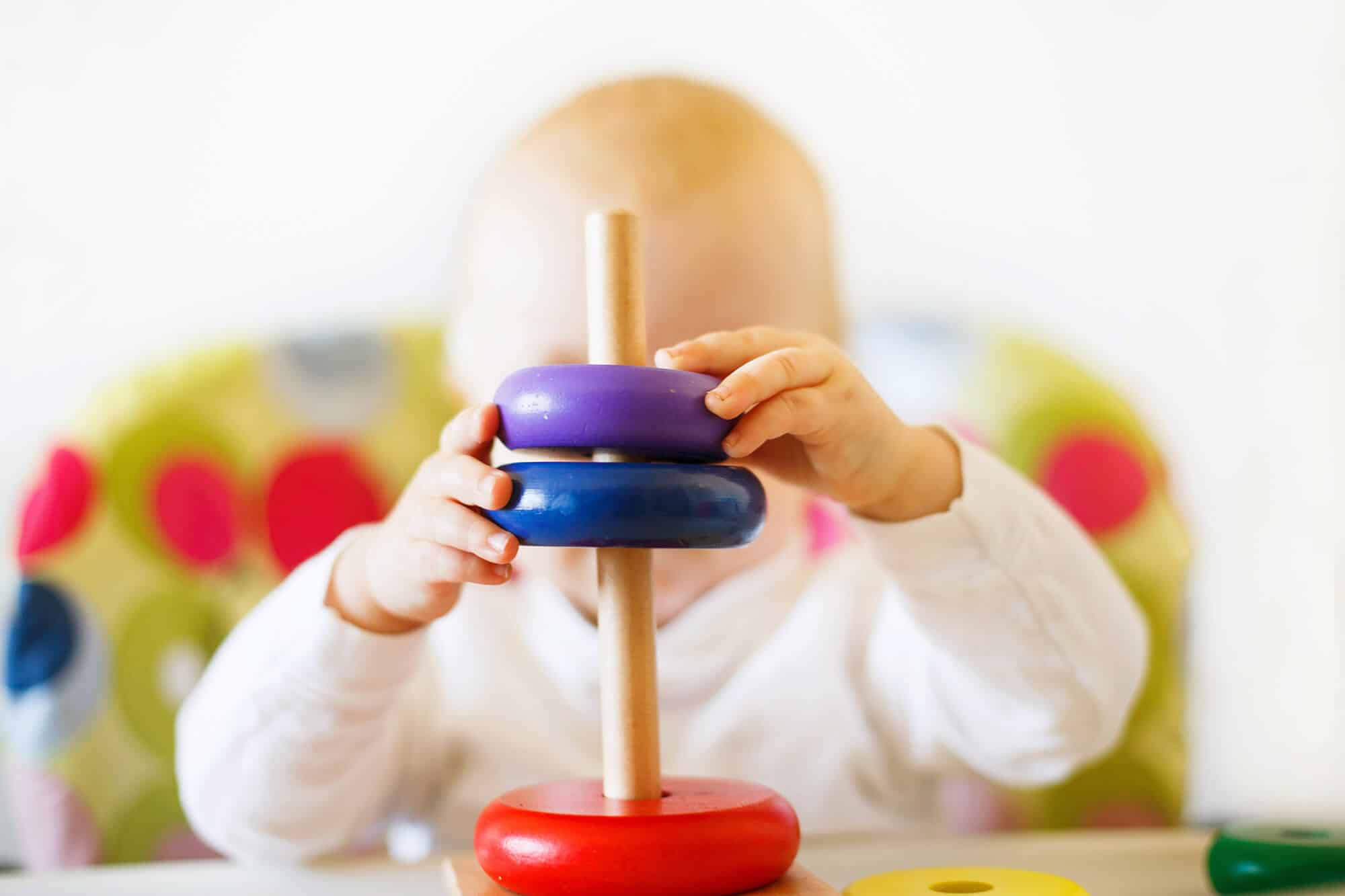 the-kid-plays-the-pyramid-child-playing-with-wood-2023-11-27-05-13-36-utc.jpg